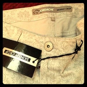 Gray and white skinny pants